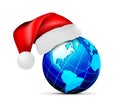 Globe in a hat of santa claus, on a white background Royalty Free Stock Photo