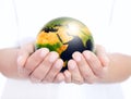 Globe holded in human hands Royalty Free Stock Photo