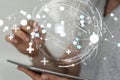 A globe hologram with interconnected dots on a businessman's tablet - world wide web concept Royalty Free Stock Photo