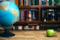 The globe in the library school, university, college on the table. Travel, learning and study concept. Copy space Royalty Free Stock Photo