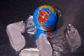 The globe lies in the ice. Planet earth. Global warming Royalty Free Stock Photo