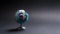 Globe made of garbage on a dark background. The concept of pollution of the planet with garbage.