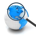 Globe with magnifying glass over north america and Royalty Free Stock Photo