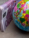 Globe, Map Of Europe, Eu Banknotes In Denominations Of 500 Euros