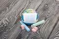 Globe with medical mask. Nearby are crayons. Academic year during the epidemic Royalty Free Stock Photo