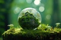 Globe On Moss In Forest, Illustrating Environmental Earth Day Concept