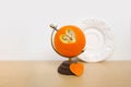 Globe with orange, beautiful composition with heart carved in citrus, concept of world of love, vitamins, healthy eating, healthy