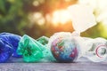 Globe in plastic bag with plastic bottles, earth pollution Royalty Free Stock Photo