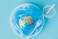 Globe on a plastic plate. The concept of ecology, land conservation