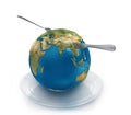 Globe on a plate with a fork and knife,