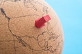 Globe with red arrow pin pointing at USA map blue background copy space. United states of America is business and finance hub Royalty Free Stock Photo