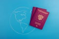Globe and Russian passport, close-up