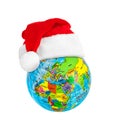 Globe and Santa Claus red christmas hat Royalty Free Stock Photo