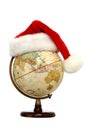 Globe with Santa Hat Royalty Free Stock Photo