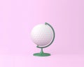 Globe sphere orb golf concept on pastel pink background. minimal