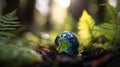 The Globe Surrounded by Lush Green Ferns in a Serene Forest Setting AI generated image Royalty Free Stock Photo