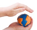 globe symbolizing the land in the hands Royalty Free Stock Photo