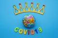 Globe and text COVID 19 on a blue background. Coronavirus / Corona virus concept. The spread of corona virus in the World Royalty Free Stock Photo