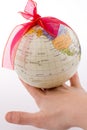 Globe tied with ribbon Royalty Free Stock Photo