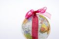 Globe tied with ribbon Royalty Free Stock Photo