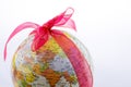 Globe tied with ribbon Royalty Free Stock Photo