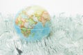 Globe with Tinsels Royalty Free Stock Photo