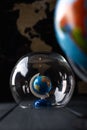 Globe under a glass bell. The concept of isolating the world during the coronavirus pandemic