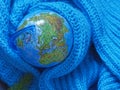 Of the globe was wrapped in a turquoise scarf knit