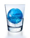 Planet Earth in glass of water Royalty Free Stock Photo