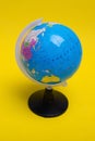 Globe on a yellow background