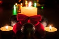 Globes, candles and a red bow Royalty Free Stock Photo