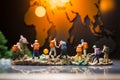 Globetrotting scene Miniature figures walking, exploring on a world map