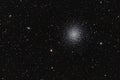 Globular star cluster M13, through my amateur telescope, out of my backyard. Royalty Free Stock Photo