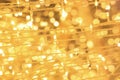 Gloden bokeh glitter lighting up background Royalty Free Stock Photo