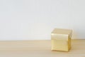 Gloden gift box on table background Royalty Free Stock Photo