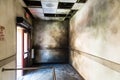 Gloomy burned hall and opened fire exit. Royalty Free Stock Photo