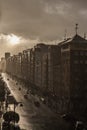 Gloomy city street during a downpour Royalty Free Stock Photo