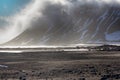 Cloud caught on the glacial sheet, nunatak in fog Royalty Free Stock Photo