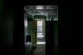 Gloomy dark corridor in an old abandoned house and open doors Royalty Free Stock Photo