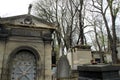 Gloomy day, with many headstones and mausoleums, Pere LaChaise Cemetery, Paris, France, 2016