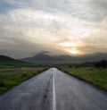 Gloomy sunset on the empty road Royalty Free Stock Photo