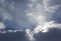 Gloomy winter cloudy sky and rays of sun Royalty Free Stock Photo