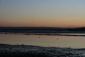 Glorious but freezing Sunset over a Scottish coastal village Bay