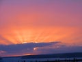 Glorious sunset bursts the clouds over the Roseland peninsula near Caerhays Castle Hemmick on the south coast of Cornwall England