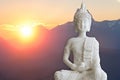 Glorious Sunrise with a peacful Buddha statue for a start of the new day