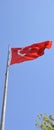 Glorious Turkish red flag on the blue sky Royalty Free Stock Photo