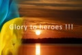 Glory to Ukraine, the last words of a soldier on the background of the sunset over the Dnieper River in Ukraine and the
