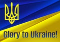 Ukrainian flag and coat of arms with the slogan `Glory to Ukraine` in English language.