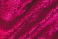 Gloss background made of two-sided sequins. Holiday background. Festive concept. Fuchsia background Royalty Free Stock Photo