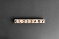 Glossary - word from wooden blocks with letters